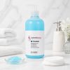 One Gel Centro Beauty 500 ml ambientato in cabina estetica con dischetti di cotone e gel detergente