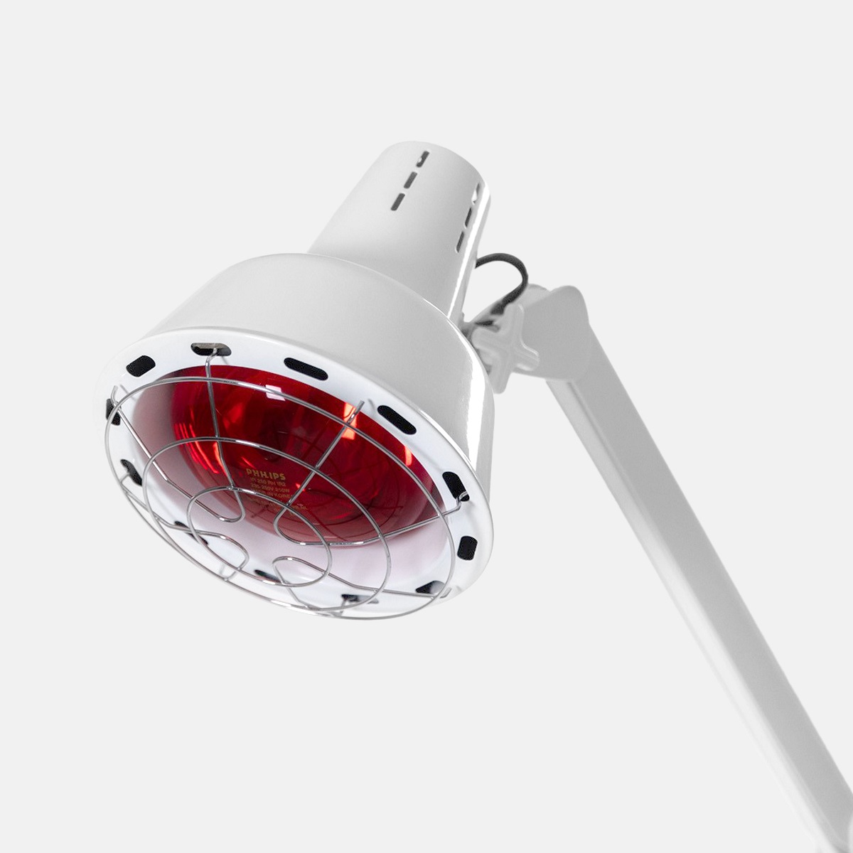 Primo piano della lampadina a infrarossi Philips della lampada MYSO, con protezione in metallo per un uso sicuro.