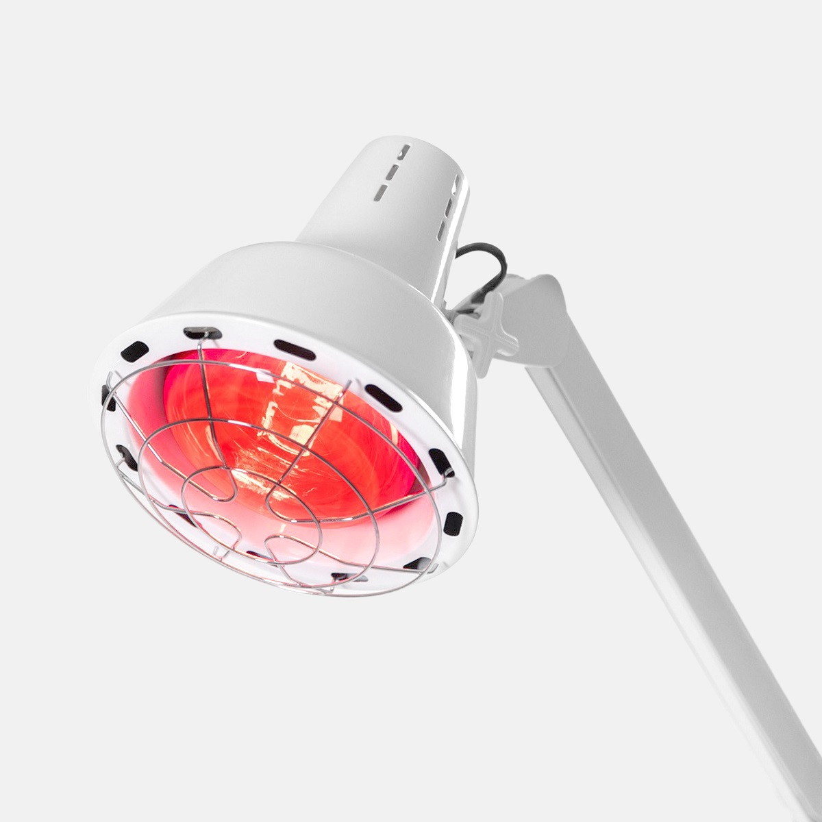 Lampadina Philips della lampada MYSO accesa, che emette luce a infrarossi per trattamenti di calore.