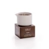 Candela da massaggio al cacao Vivalu in contenitore bianco su scatola marrone, con proprietà antietà e profumo rilassante.