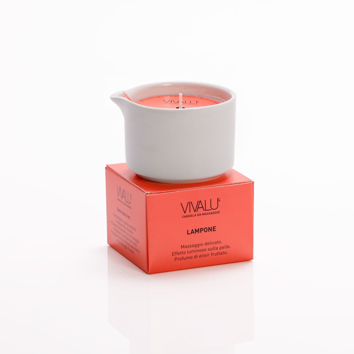Candela da massaggio VIVALU al lampone su scatola.