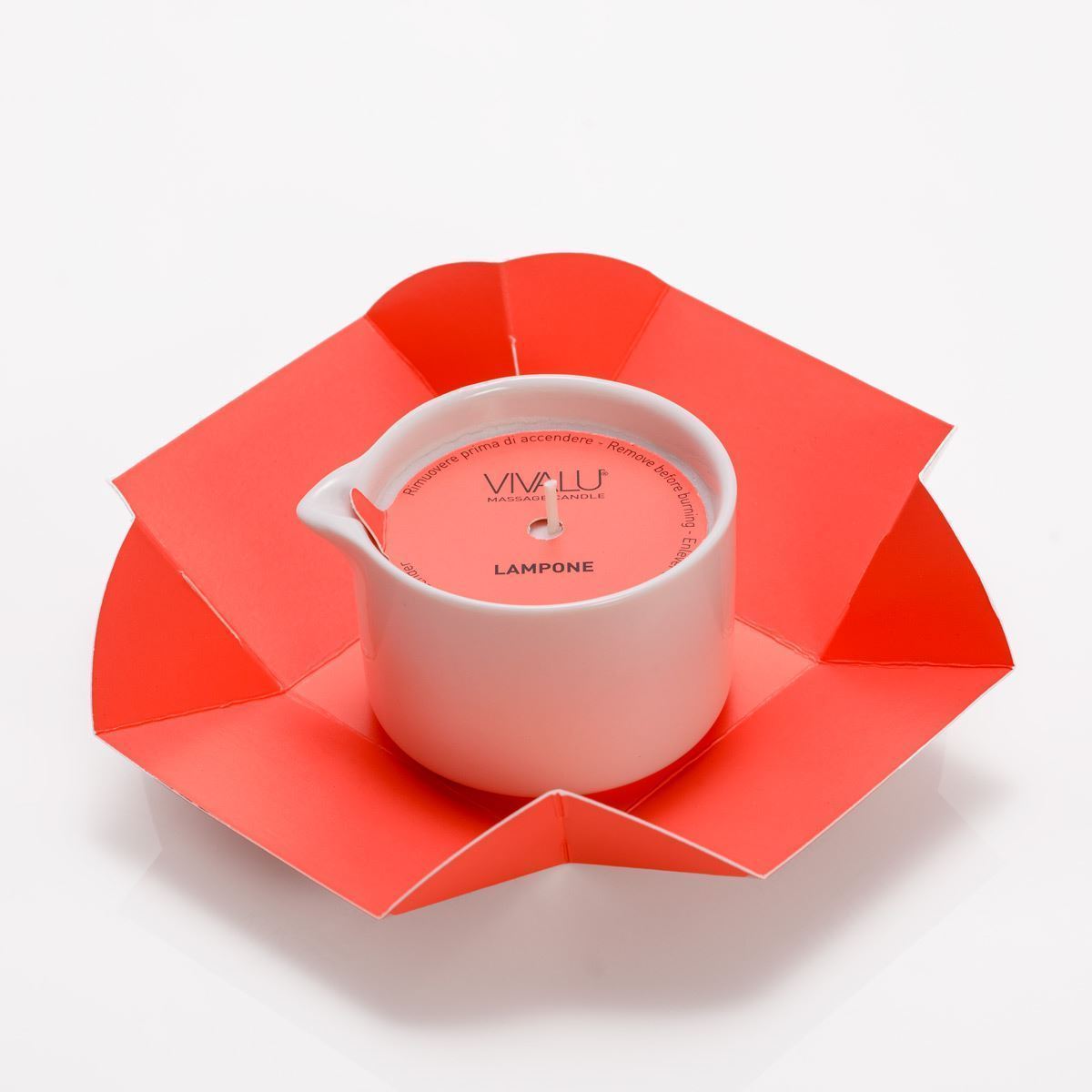 Candela da massaggio VIVALU al lampone con confezione aperta a petali.