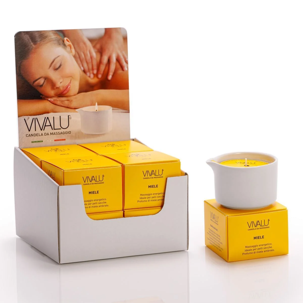 Espositore con candele da massaggio Vivalu al miele, con confezioni gialle e immagine promozionale.