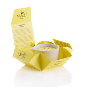 Candela da massaggio ai vinaccioli d'uva Vivalu in confezione aperta, con istruzioni dettagliate stampate all'interno.